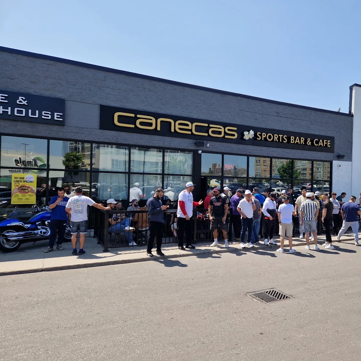 Canecas Sports Bar — 605 Rogers Rd, York, ON M6M 1B9, Canada